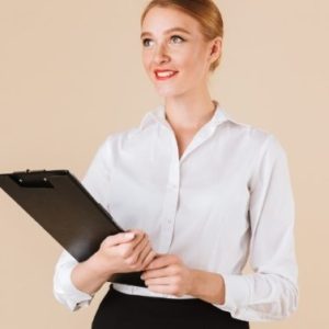 demo-attachment-1740-amazing-business-woman-holding-clipboard-looking-8E2Y5Z7